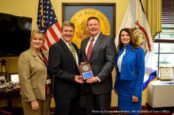 Secretary Warner Presents Stephen Christian with National Award for Business Development Secretary Warner Presents Stephen Christian with National Award for Business Development